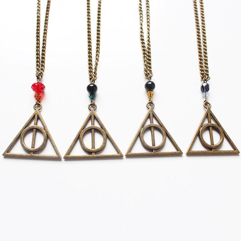 Ensemble de 5 colliers Harry Potter Retourneur de temps Vif d'or Reliques  de la Mort pour les fans de Harry Potter, Argent, Moyen : : Mode